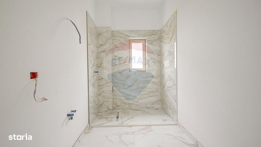 Casă cu 5 camere decomandat cu Teren 500 Mp în Tărlungeni