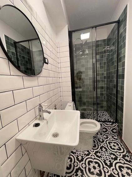 Apartament cu 3 camere semidecomandat în Dorobanți