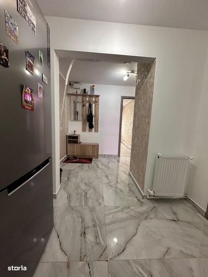 De vanzare apartament cu 3 camere si balcon, renovat, 70mp,etajul 2 - 10