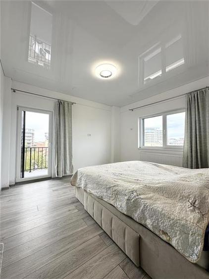 Apartament cu 3 camere semidecomandat, mobilat în Nord