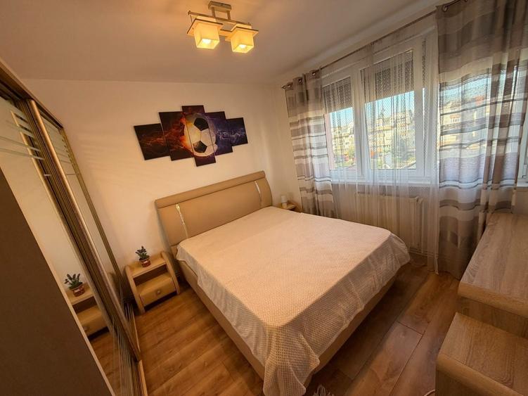 Apartament cu 2 camere semidecomandat, mobilat în Central