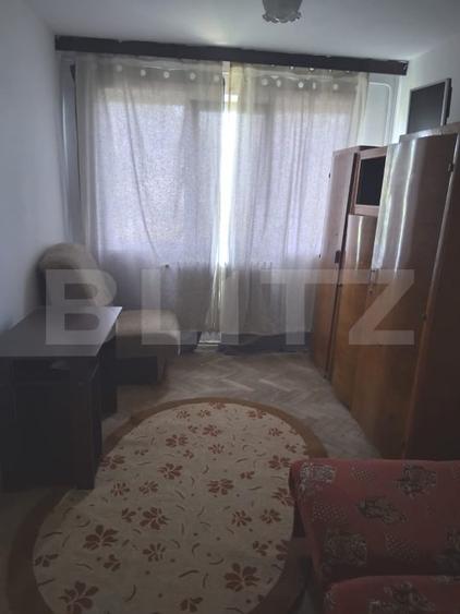 Apartament cu 2 camere semidecomandat, mobilat în Podu Roș