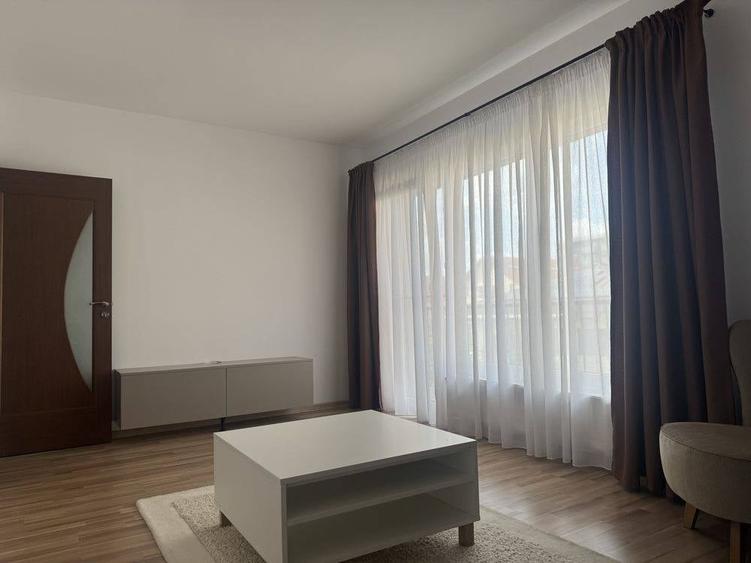 Apartament nou cu 2 camere, 60mp, etaj 1, finisat modern, mobilat si utilat, cu garaj, in Buna Ziua - 1