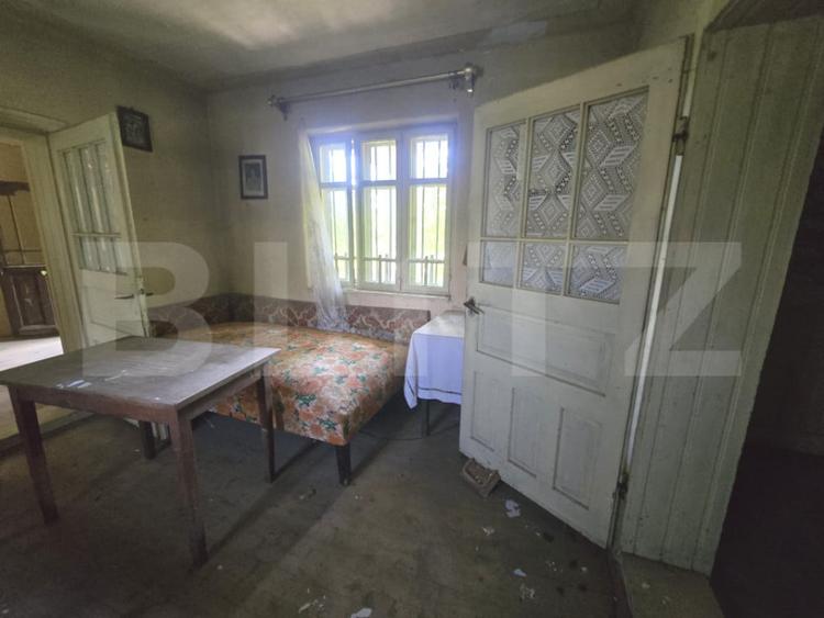 Casă cu 3 camere cu Teren 1954 Mp în Tomșani