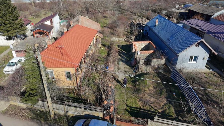 Casă cu 4 camere cu Teren 1974 Mp în Comana