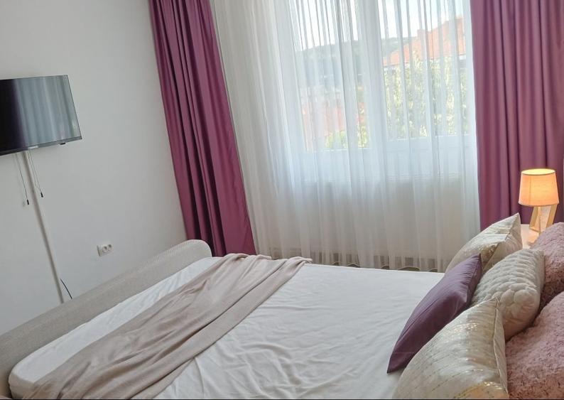 Apartament cu 2 camere semidecomandat, mobilat în Central