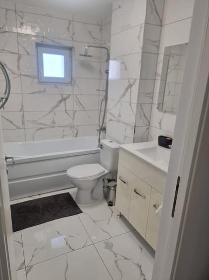 Apartament cu 3 camere decomandat, mobilat în Sud