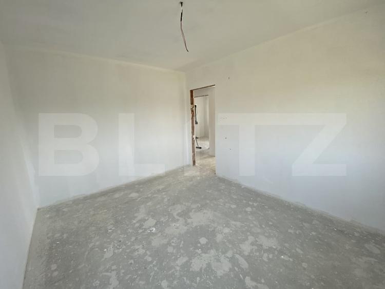 Casă individuală cu 4 camere cu Teren 500 Mp în Exterior Sud