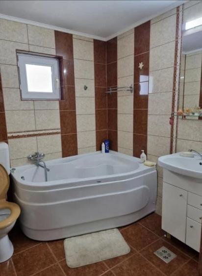 Casă cu Teren 1000 Mp în Central