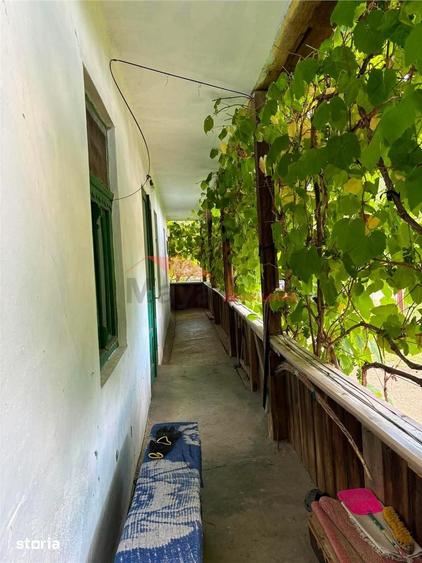 Casă cu 2 camere cu Teren 1000 Mp în Coldău
