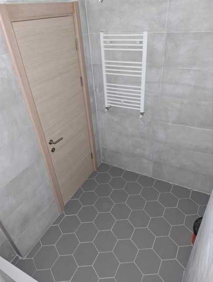 Apartament cu 3 camere decomandat în Titan