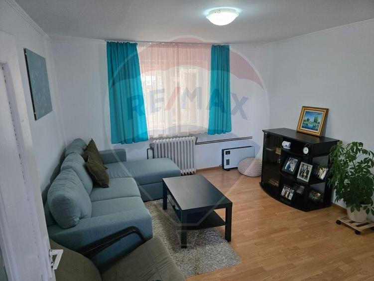 Casă cu 4 camere cu Teren 1000 Mp în Central