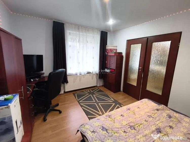 Casă cu 5 camere cu Teren 180 Mp în Muncitoresc
