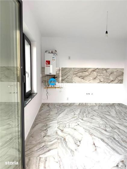 Casă cu 4 camere cu Teren 450 Mp în Valea Ursului