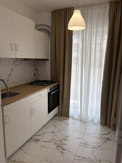 Apartament cu 2 camere semidecomandat, mobilat în Central