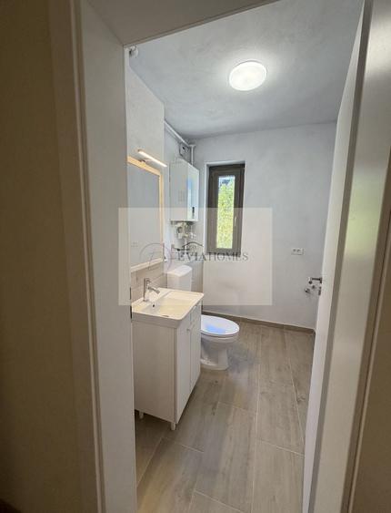 Apartament cu 3 camere semidecomandat, mobilat în Borhanci