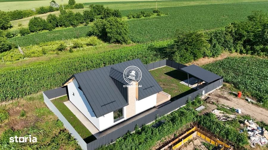 Casă cu 4 camere cu Teren 388 Mp în Holboca