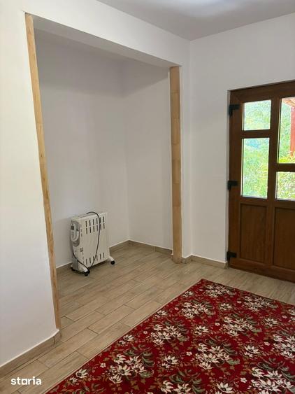 Casă cu 2 camere cu Teren 1100 Mp în Oituz