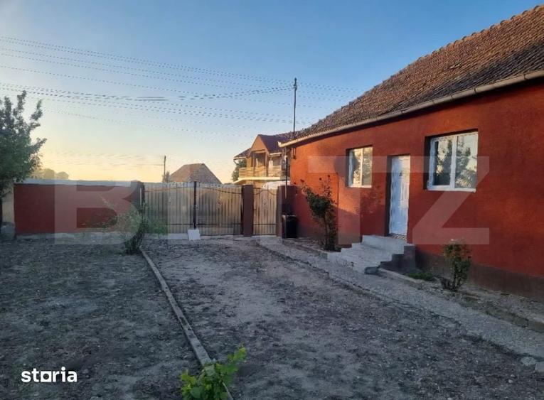 Casă cu 2 camere cu Teren 616 Mp în Sânmartin