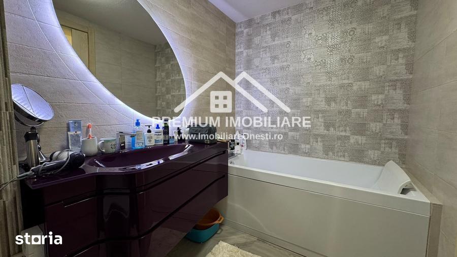 Apartament spa?ios cu 3 camere One?ti, zona centrala - 16