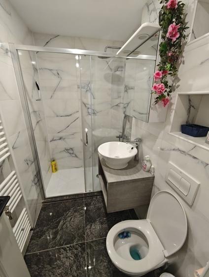 Apartament cu 2 camere decomandat în Romanești