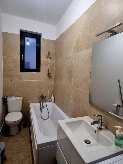 Casă individuală cu 4 camere cu Garaj în Tunari