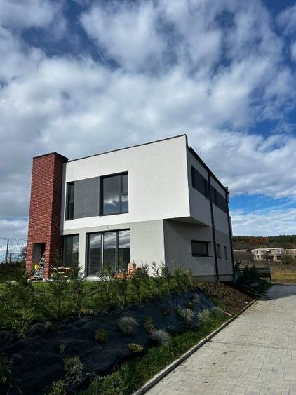 Casă individuală cu 4 camere cu Teren 395 Mp în Baciu