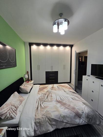 Apartament 2 camere ultrafinisat  cu gradina de 40 m2  zona Tautului - 12