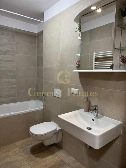 Apartament cu 2 camere decomandat în Tractorul