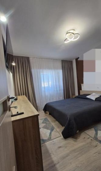 Apartament cu 4 camere semidecomandat, mobilat în Zimbru