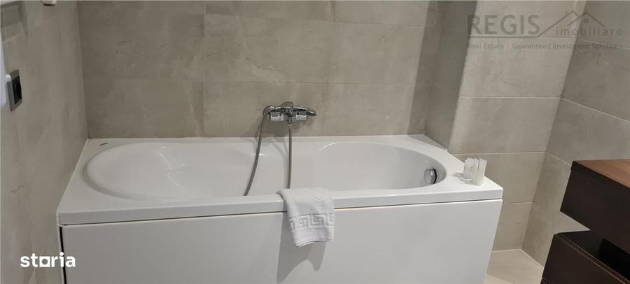 Apartament cu 2 camere decomandat în Poiana Brașov