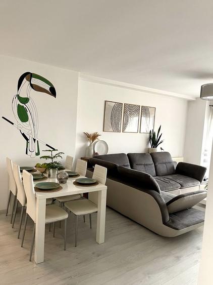 Apartament 2 camere 74,46 mp utili + terasa 6,31 mp, garaj subteran + loc de parcare exterior, boxa, complet mobilat si utilat. - 1