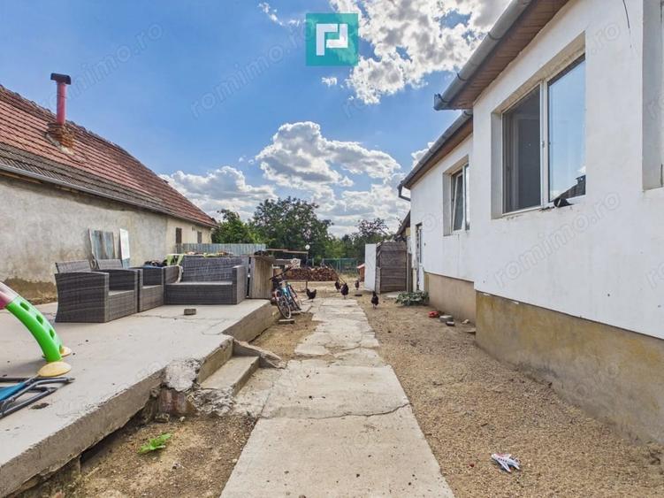 Casă cu 2 camere cu Teren 1000 Mp în Păuliș