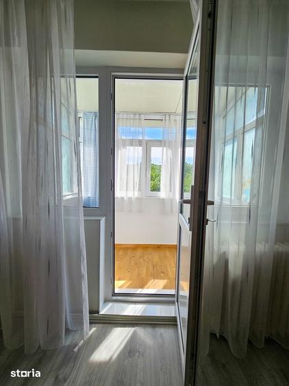 Apartament cu 2 camere semidecomandat în Podu Roș