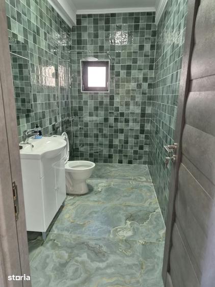 Casă cu 4 camere cu Teren 318 Mp în Central