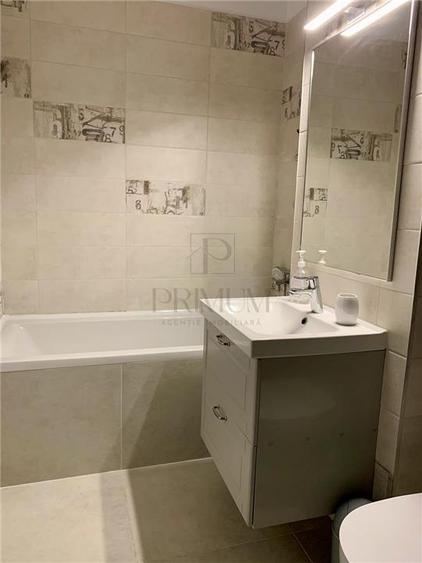 Apartament cu 2 camere semidecomandat, mobilat în Central