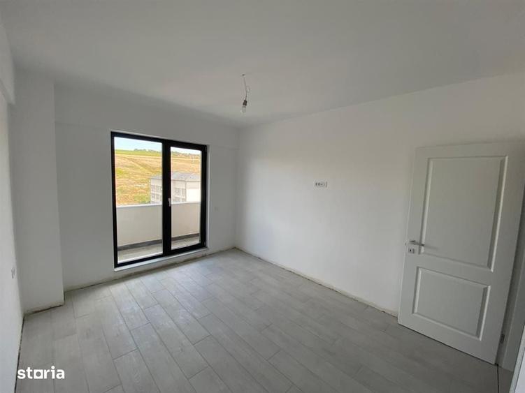 Apartament cu 2 camere decomandat în Bucium — fotografia 1