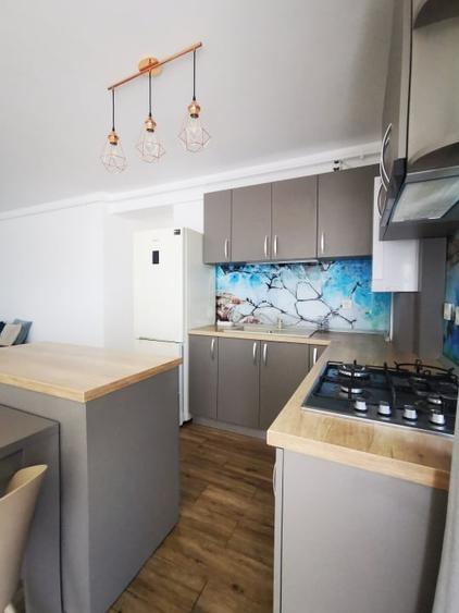 Apartament cu 3 camere decomandat, mobilat în Borhanci