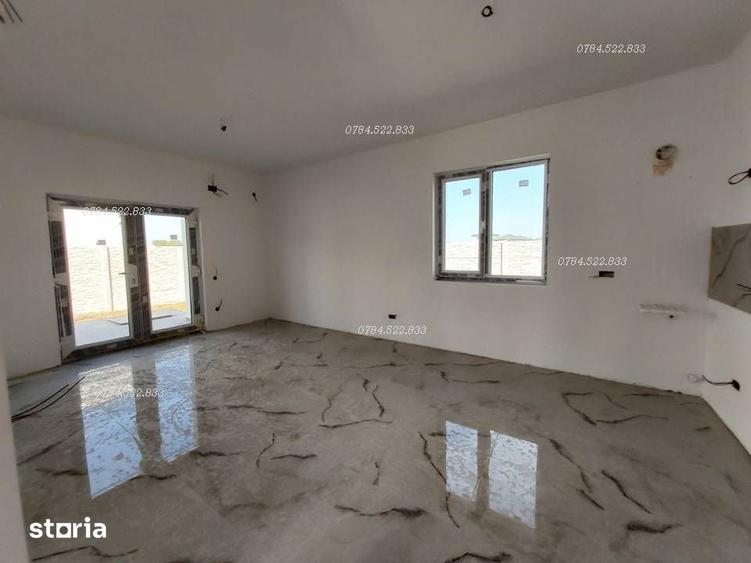 Casă cu 4 camere decomandat cu Teren 400 Mp în Berceni