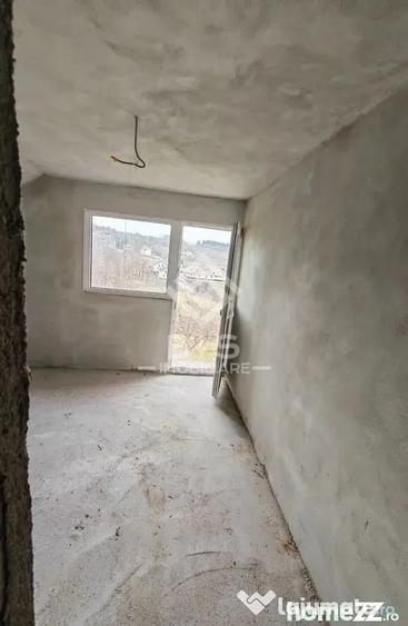 Casă cu 4 camere cu Teren 1000 Mp în Central