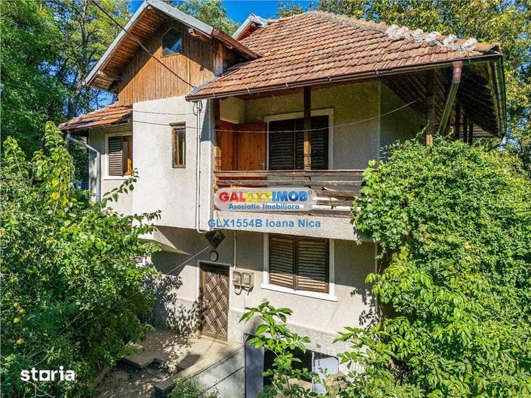 Casă cu 7 camere cu Teren 1000 Mp în Central