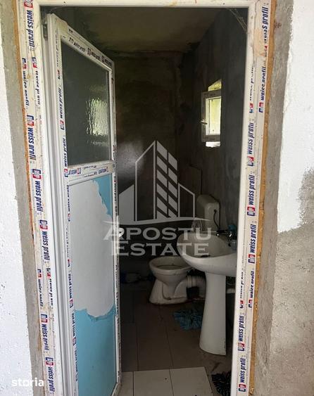 Casă cu 2 camere cu Teren 1438 Mp în Central