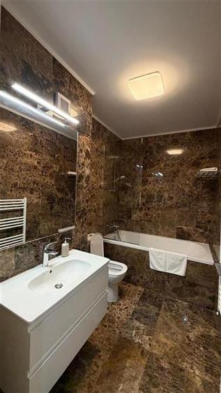Apartament cu 2 camere semidecomandat, mobilat în Mărăști