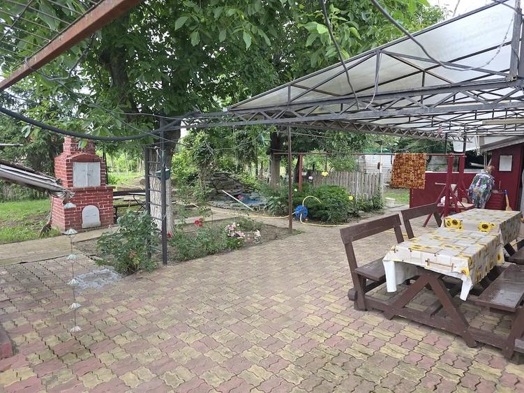 Casă cu Teren 1000 Mp în Central