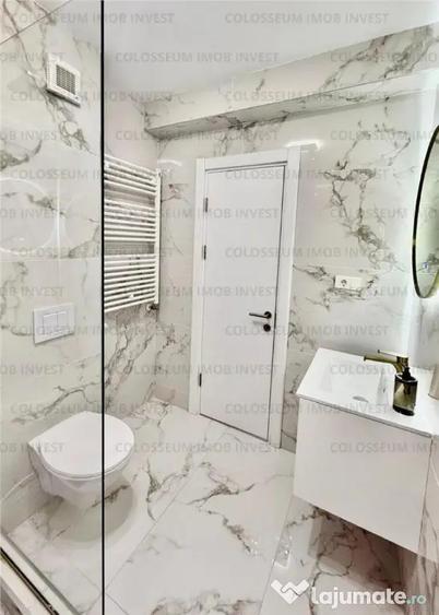 Apartament cu 3 camere decomandat în Tractorul