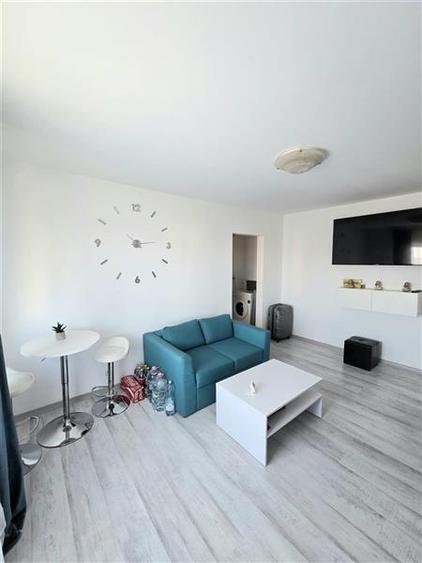 Apartament cu 3 camere semidecomandat, mobilat în Inel II