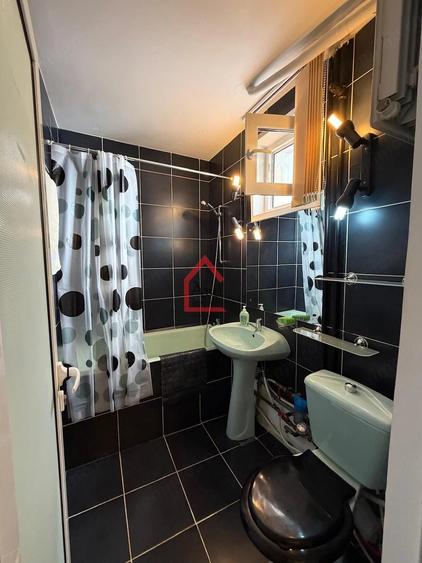 Apartament cu 3 camere decomandat în Filiași