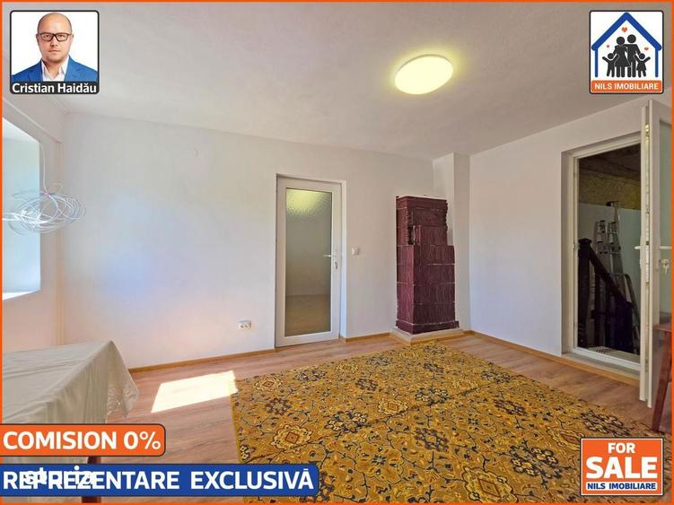 Casă cu 4 camere cu Teren 10000 Mp în Bălțești