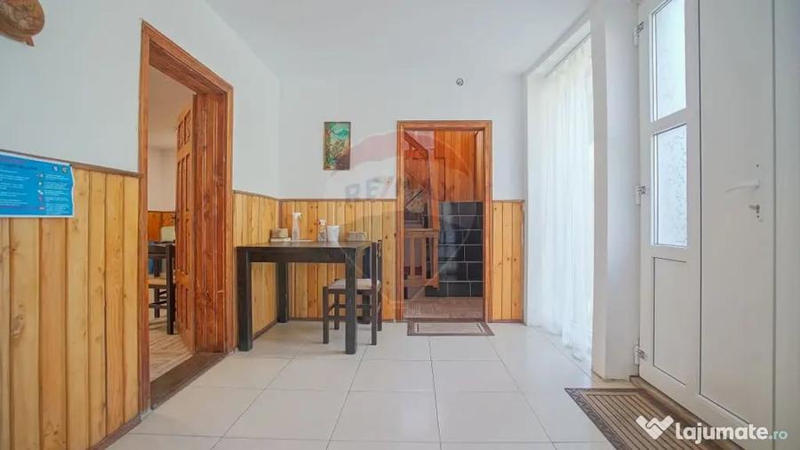 Casă cu 10 camere cu Teren 1137 Mp în Moieciu