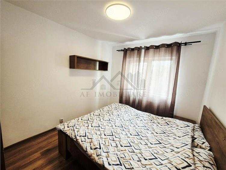 Apartament cu 3 camere decomandat în Filiași